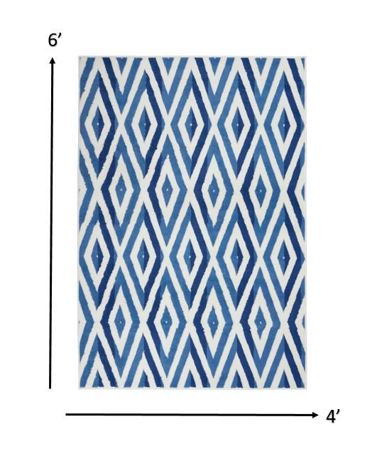 4' X 6' Blue And Ivory Geometric Dhurrie Area Rug